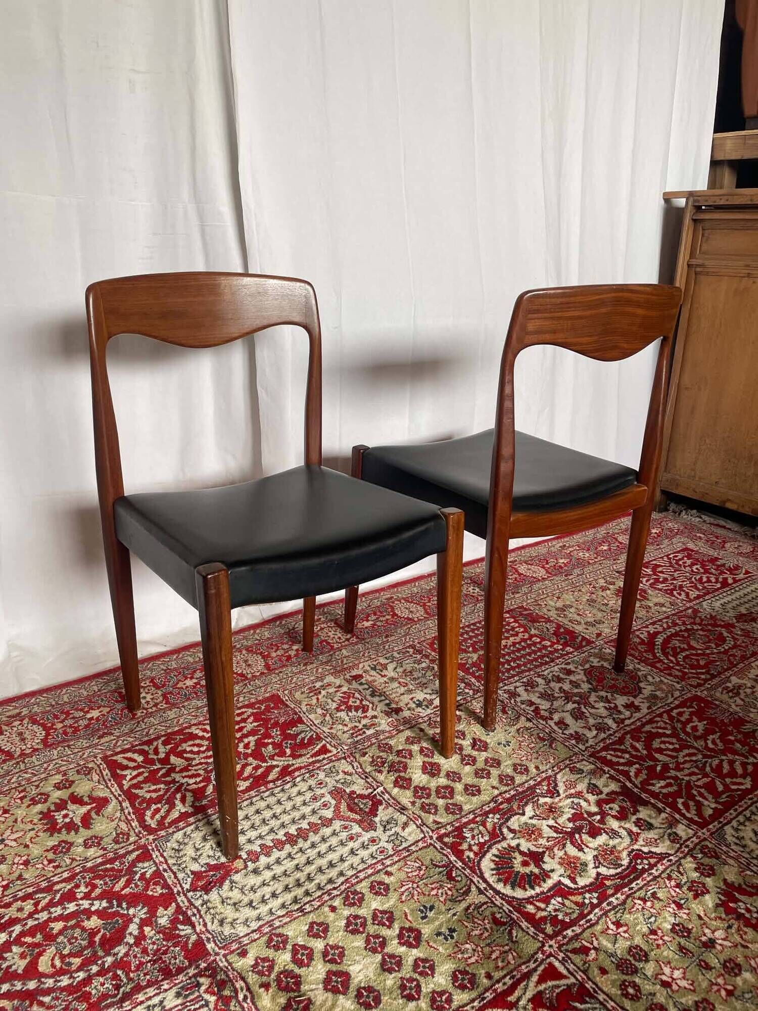 Pair of vintage teak chairs with black faux leather – Scandinavian style