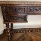 Louis XIII oak writing desk with carved twisted legs, late 19th century.