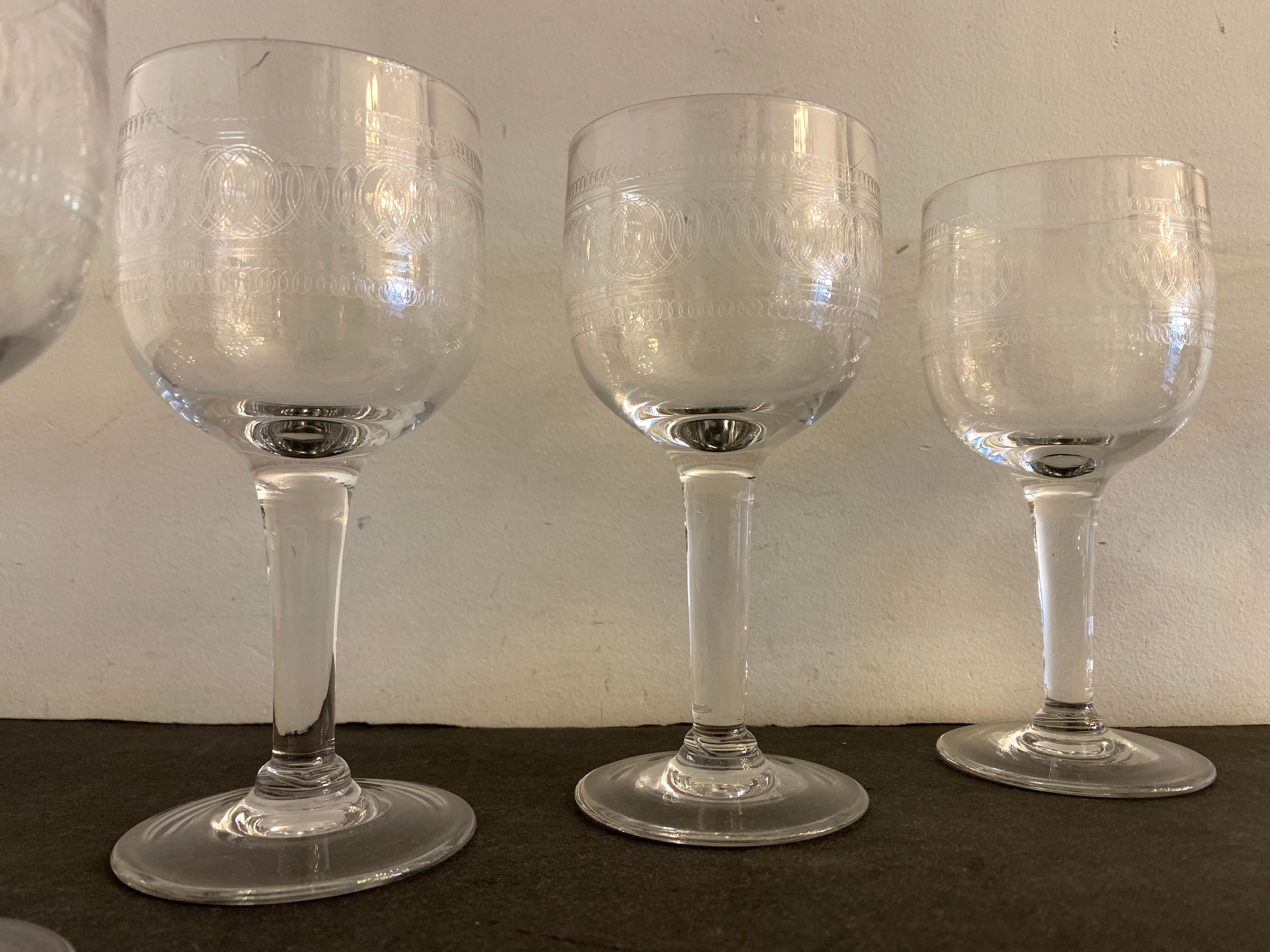 10 blown and engraved stemmed glasses