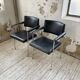Pair of chrome office chairs