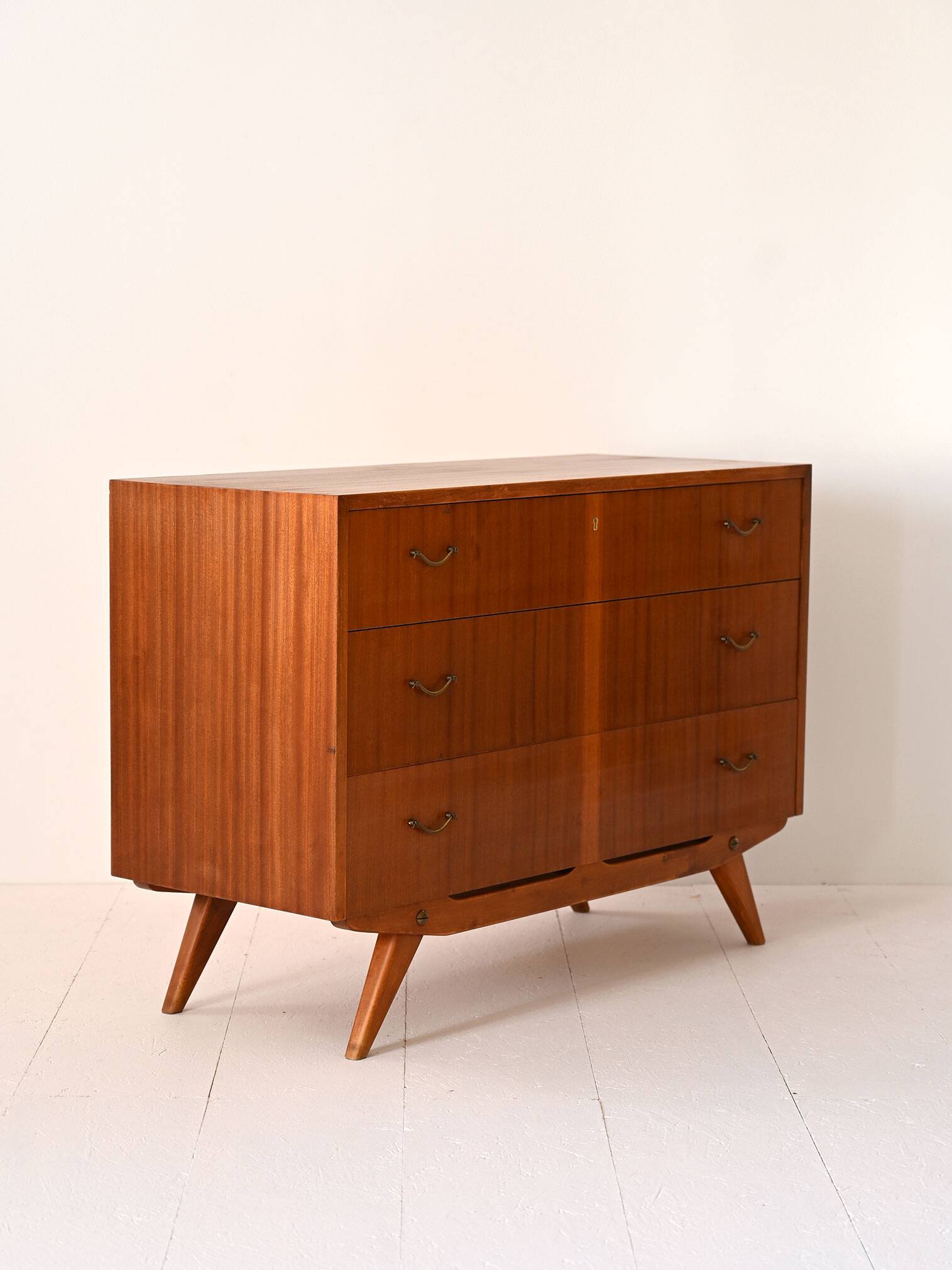 Scandinavian chest of drawers with metal handles