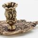Old brass hand candle holder