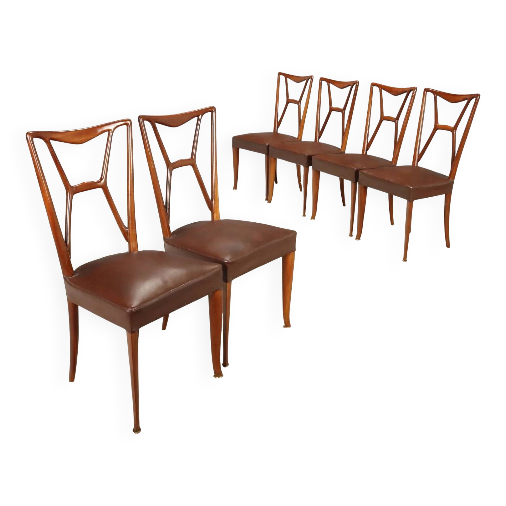 1950s chairs with wooden backs.