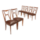 1950s chairs with wooden backs.