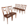 1950s chairs with wooden backs.