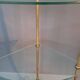 Neoclassical style 3-shelf corner cupboard in gilded brass, Circa 1950/1960.