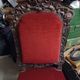 Baroque style chair in monogrammed wood and red velvet fabric