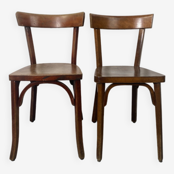 Pair of mismatched bistro chairs