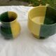 Enameled ceramic bowl and milk jug, two-tone yellow and green, vintage 1950