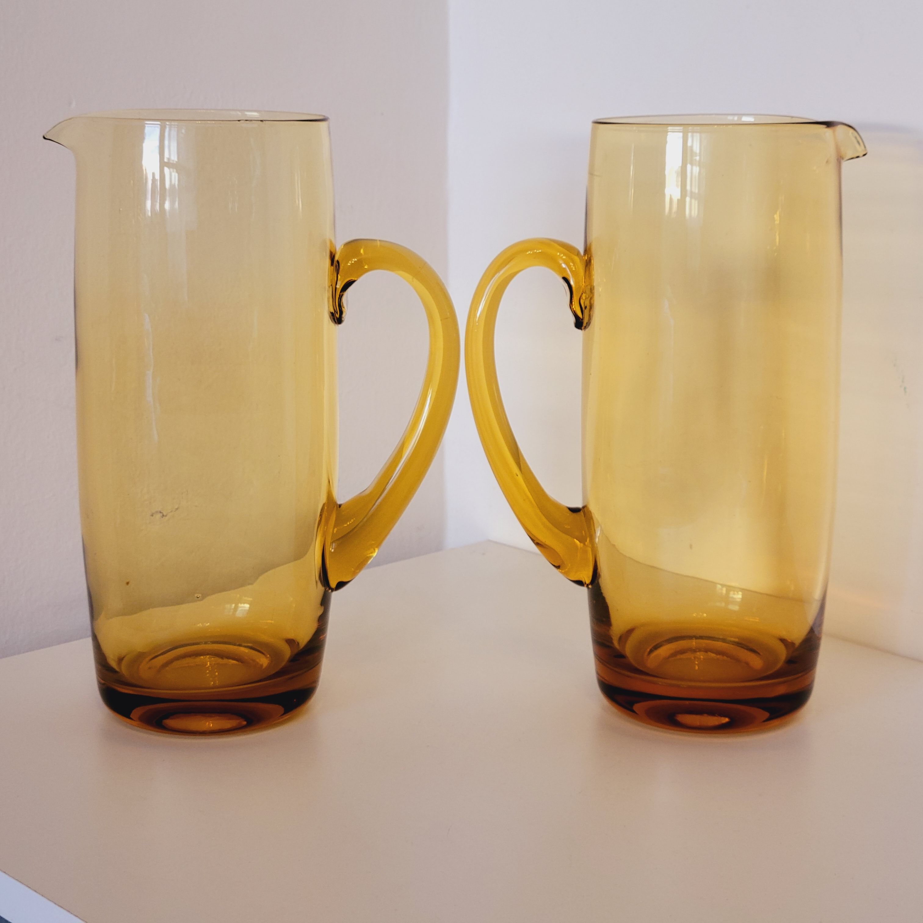 2 carafes in vintage amber yellow blown glass