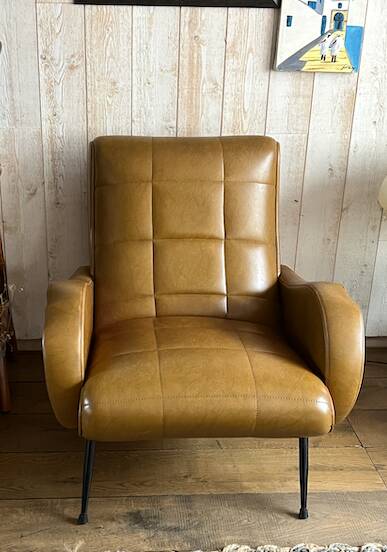 The armchairs that make a pair.