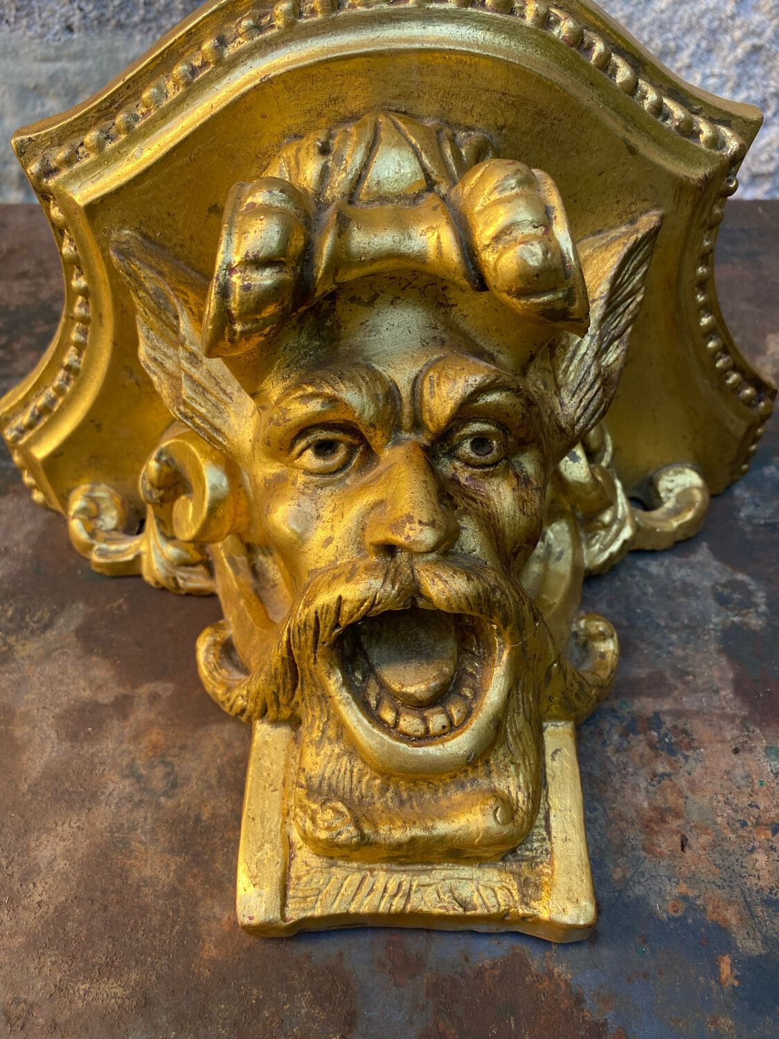 Devil's head wall console