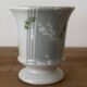 Adorable small porcelain vase from Paris with floral decoration.