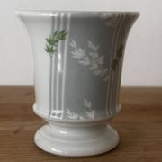 Adorable small porcelain vase from Paris with floral decoration.