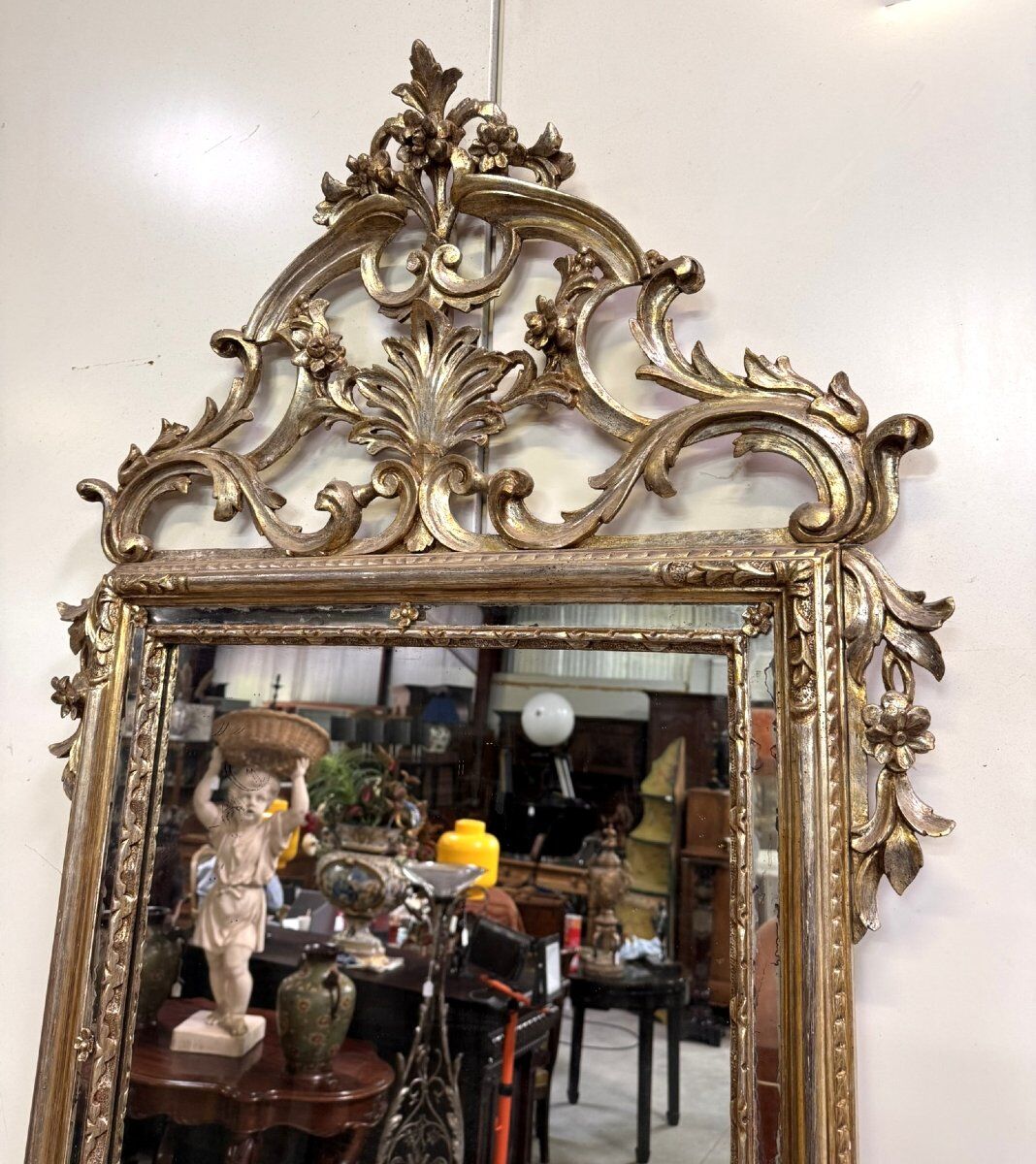 Important console table with a curved shape + Louis XV style mirror in gilded and silvered wood.