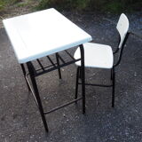 Schoolboy style desk with its white adult size chair