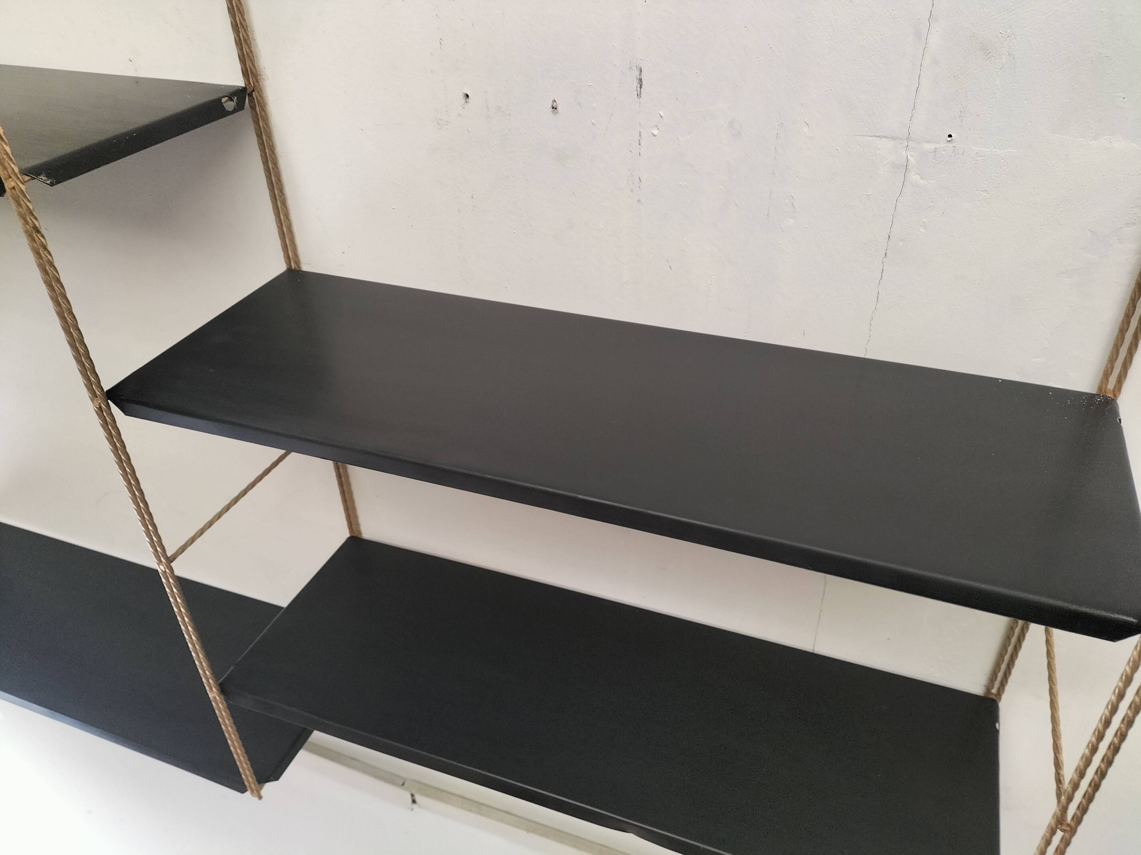 Modular black metal shelf