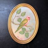 Golden frame and bird painting