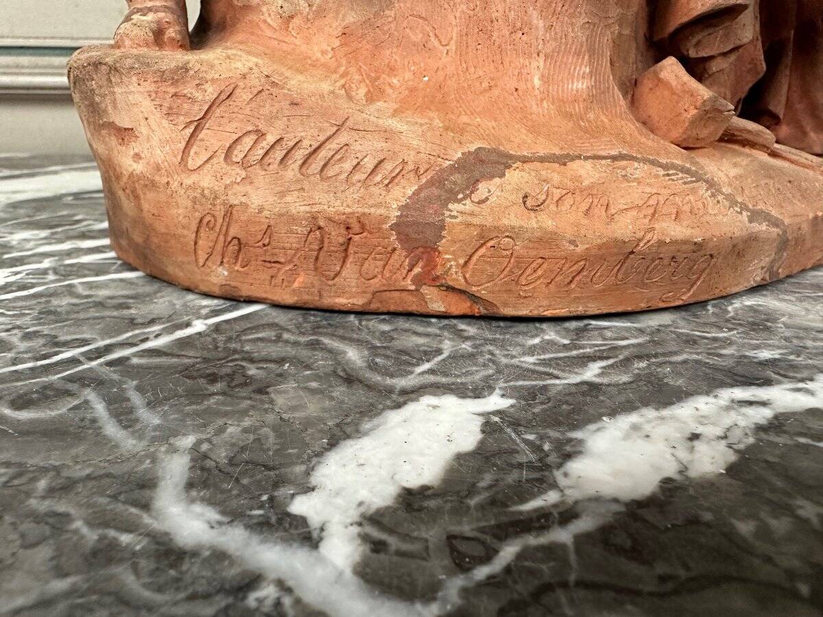 The sculpture, original terracotta signed and dedicated, Charles Van Oemberg.