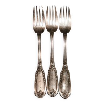 3 silver metal forks
