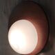 Designer wall lights in wood and opaline globe - mid-20th century