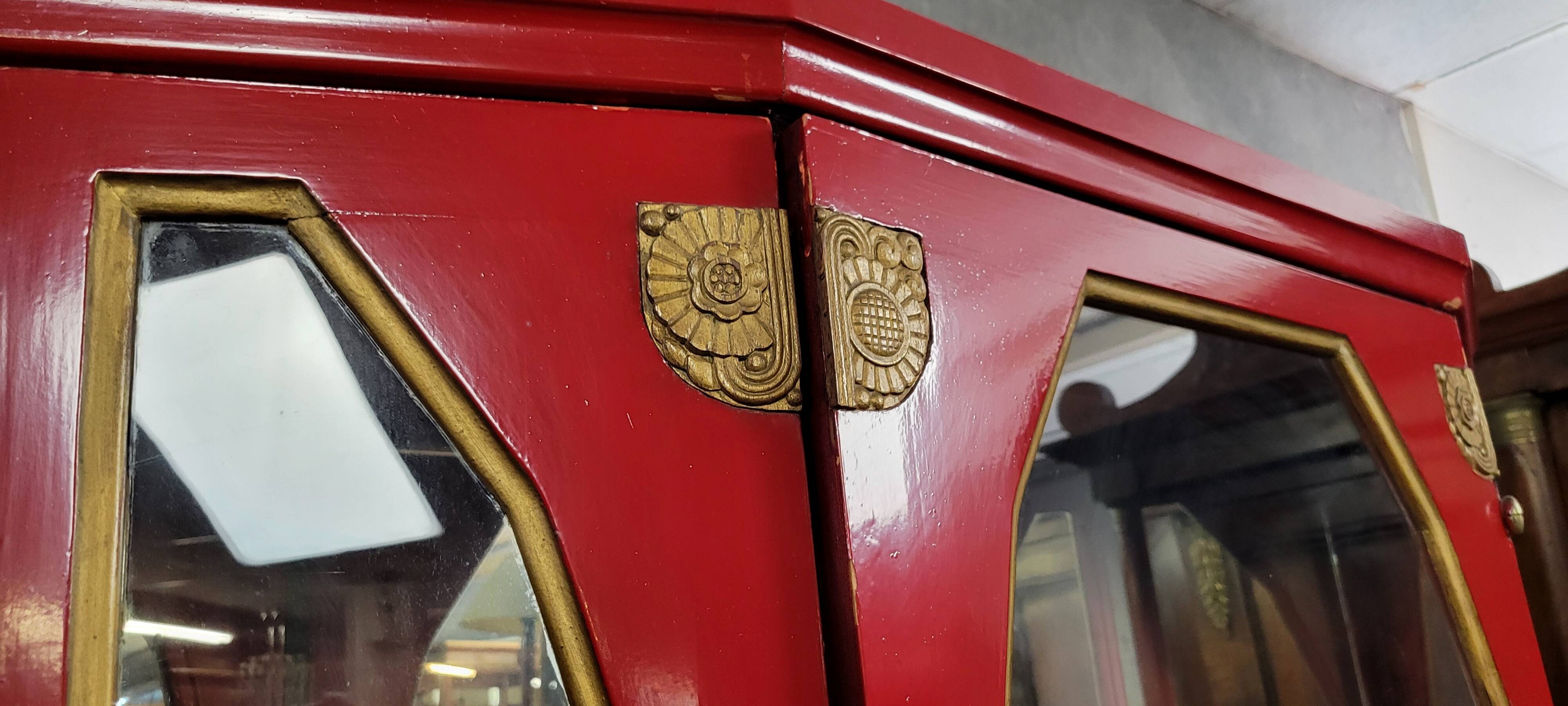 Important Art Deco period bookcase in lacquered wood and gilded bronze