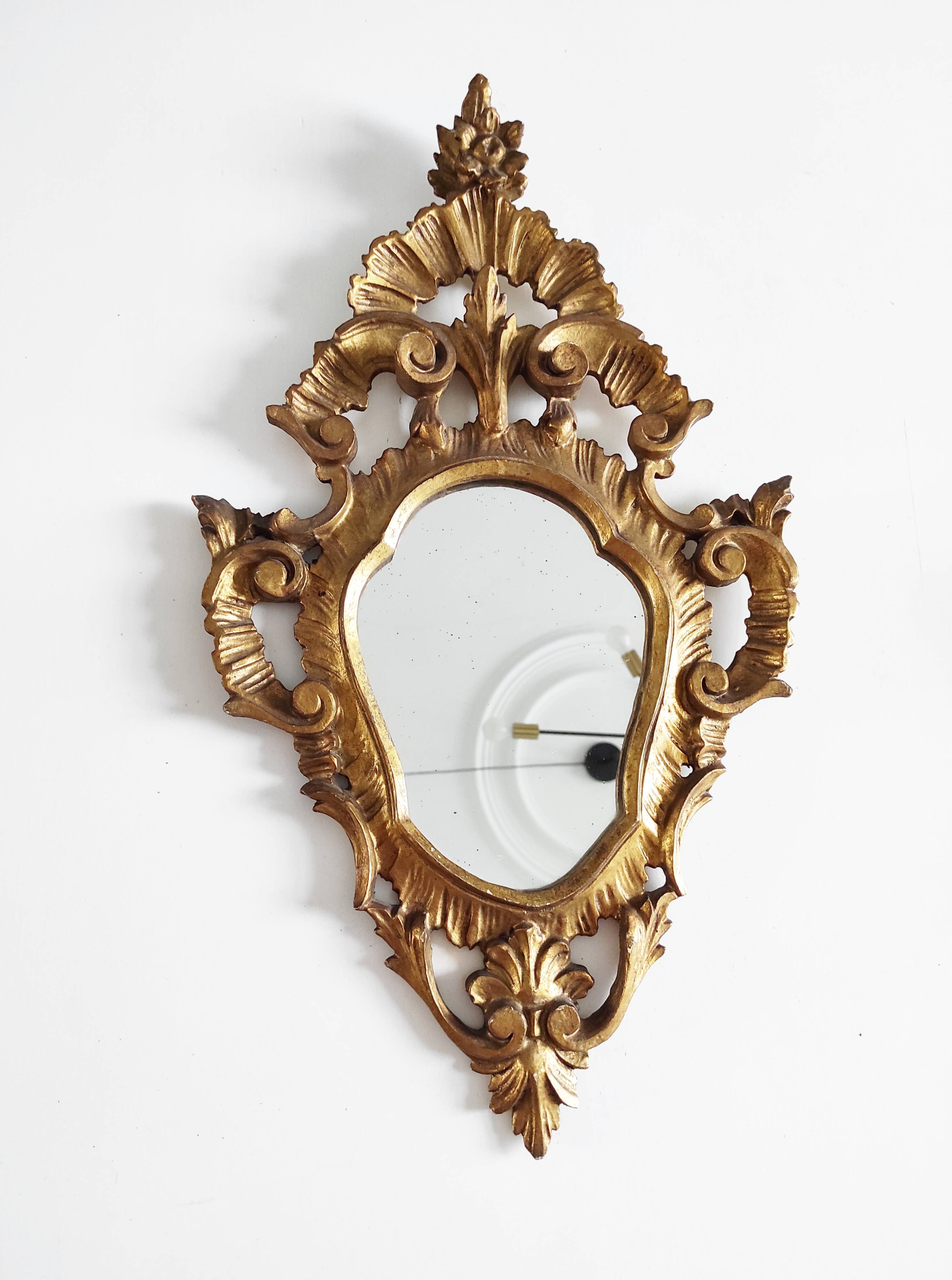Gilded wood mirror, 56 x 32 cm