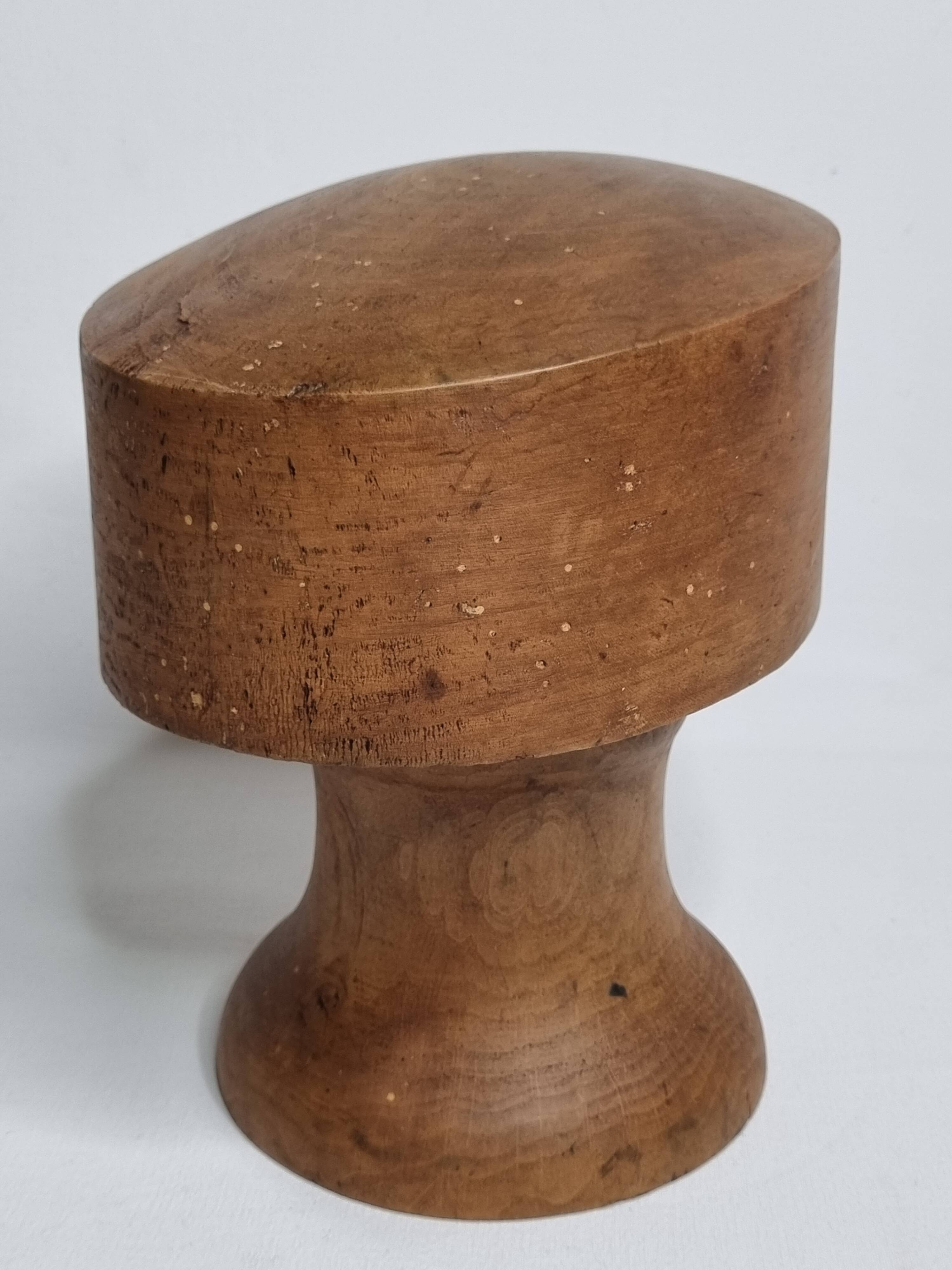 Old wooden hat shape on foot, 1900, 30