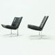 Set of 2 Danish lounge chairs by Kebe Møbler model Eagle with black leather.