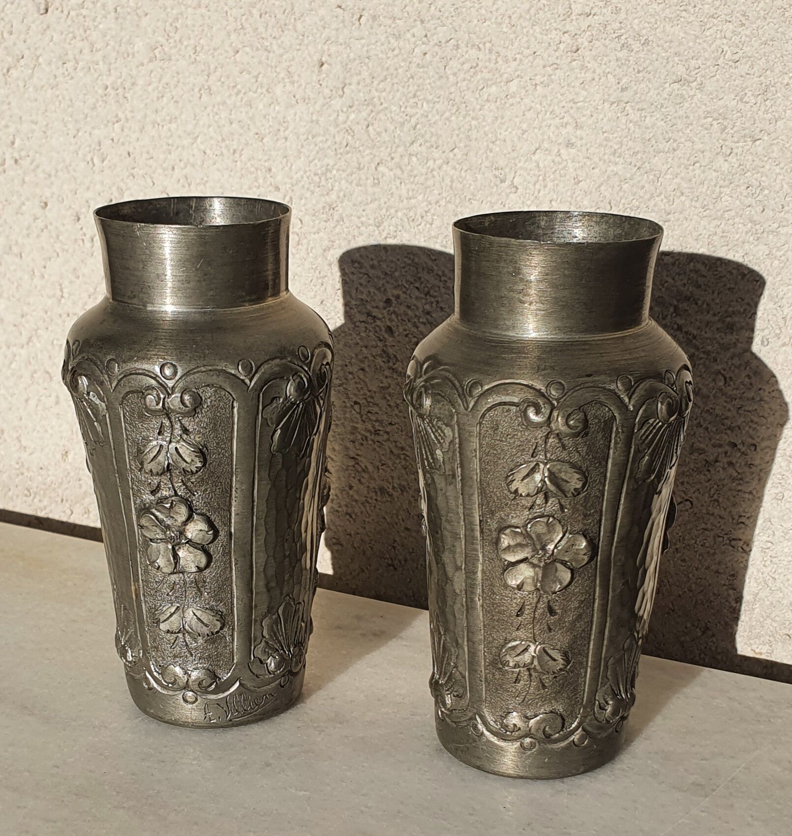 Pair of tin vases
