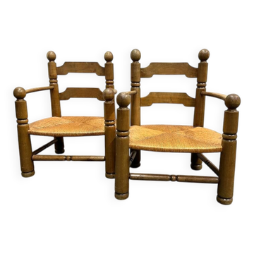 Paire de fauteuils bas en rotin Charles Dudouyt, années 1940.