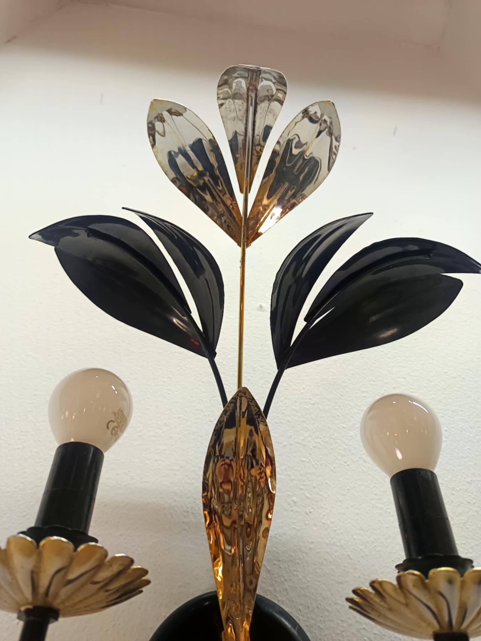 Black and gold Hollywood Regency leaf wall sconce