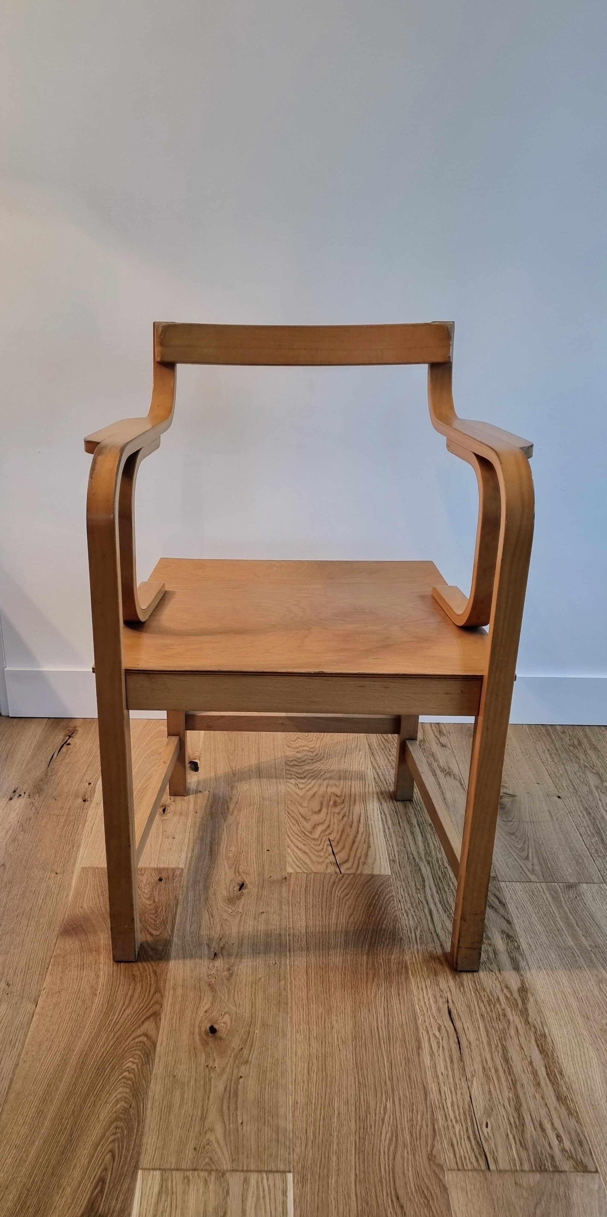 Vintage curved wood armchair