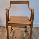 Vintage curved wood armchair