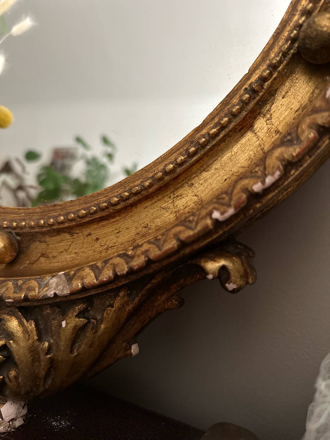 Antique gilded mirror decorated with an eagle