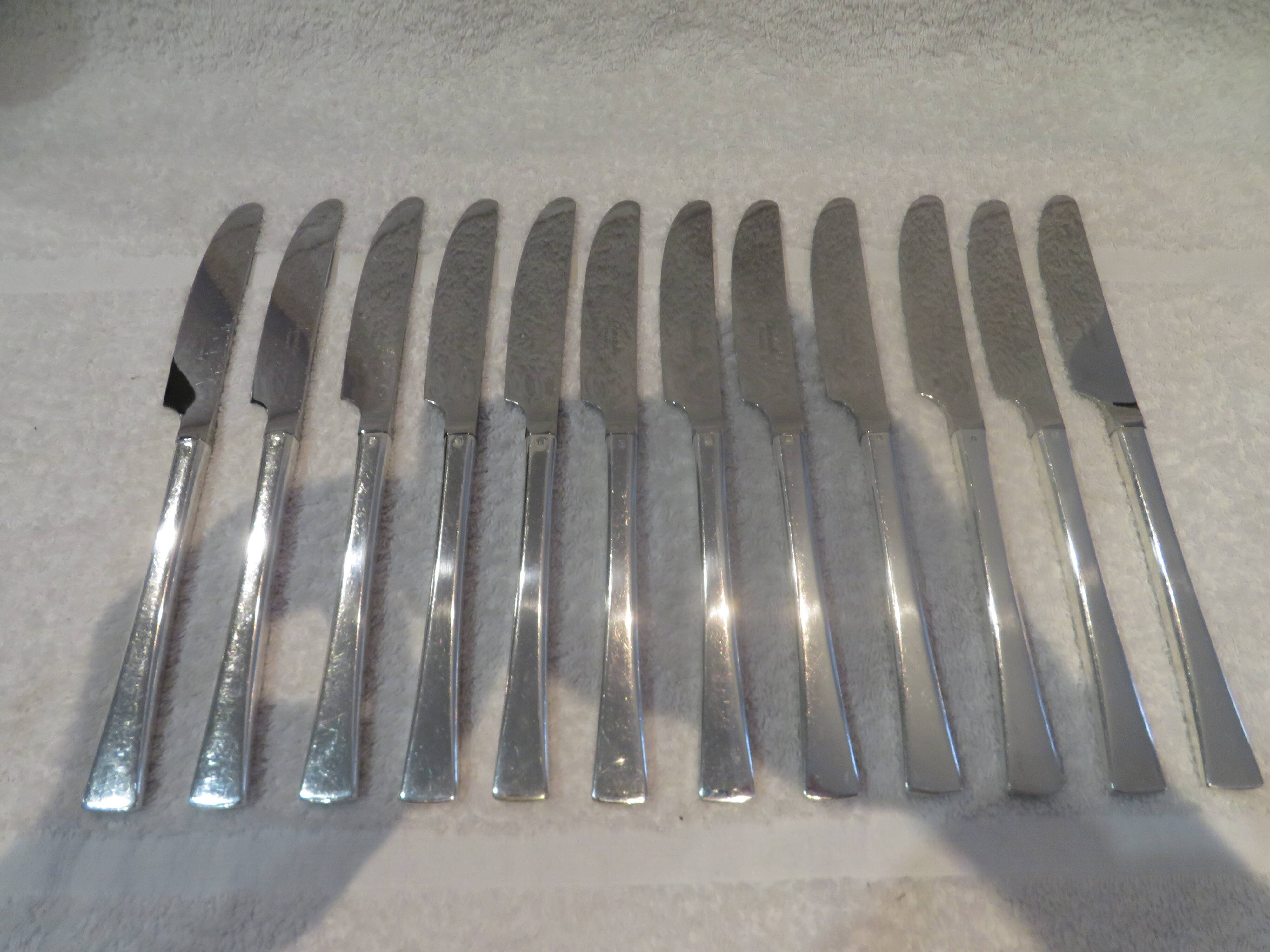 12 table knives with silver-plated metal handles, Christofle Concorde, 23.7 cm