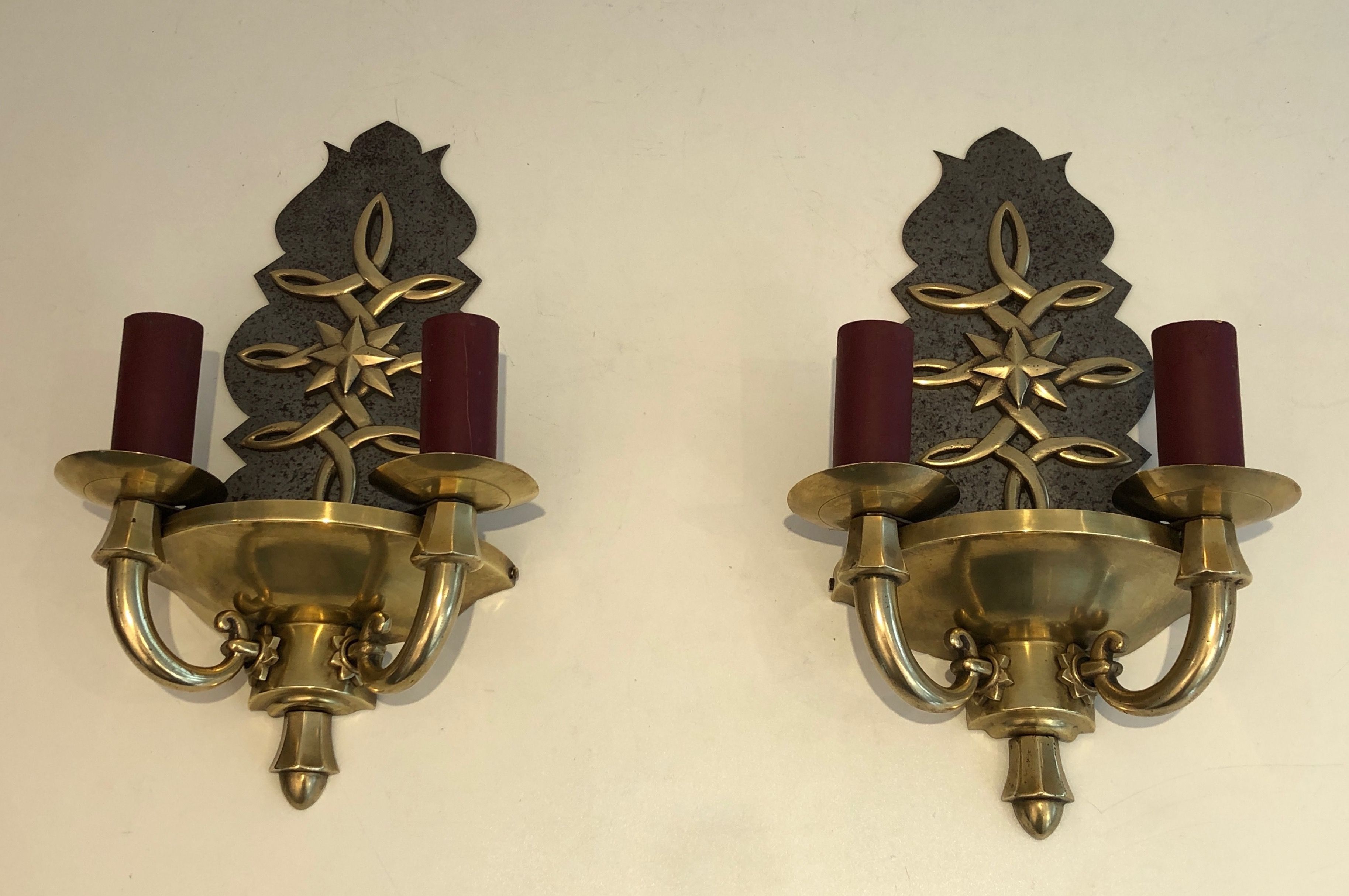 Pair of Art Deco wall sconces in the style of Jules Leleu.