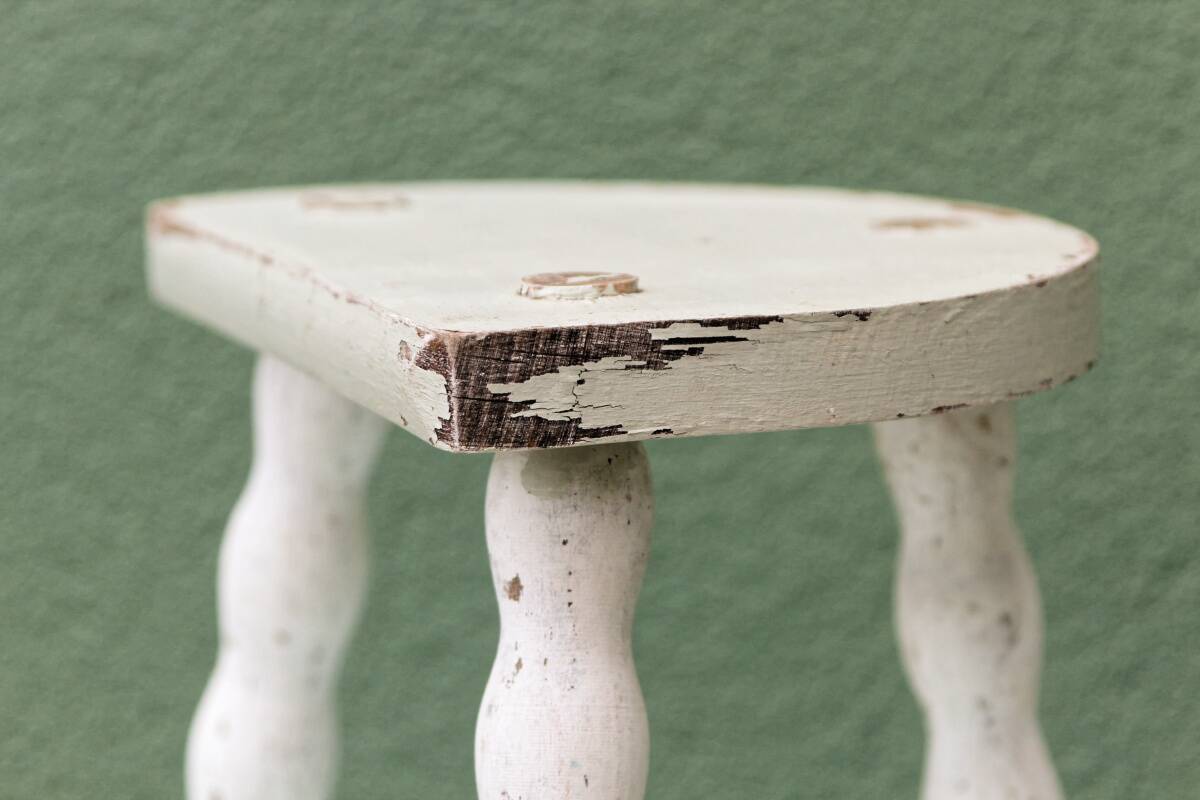 Tripod stool, twisted legs