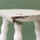 Tripod stool, twisted legs