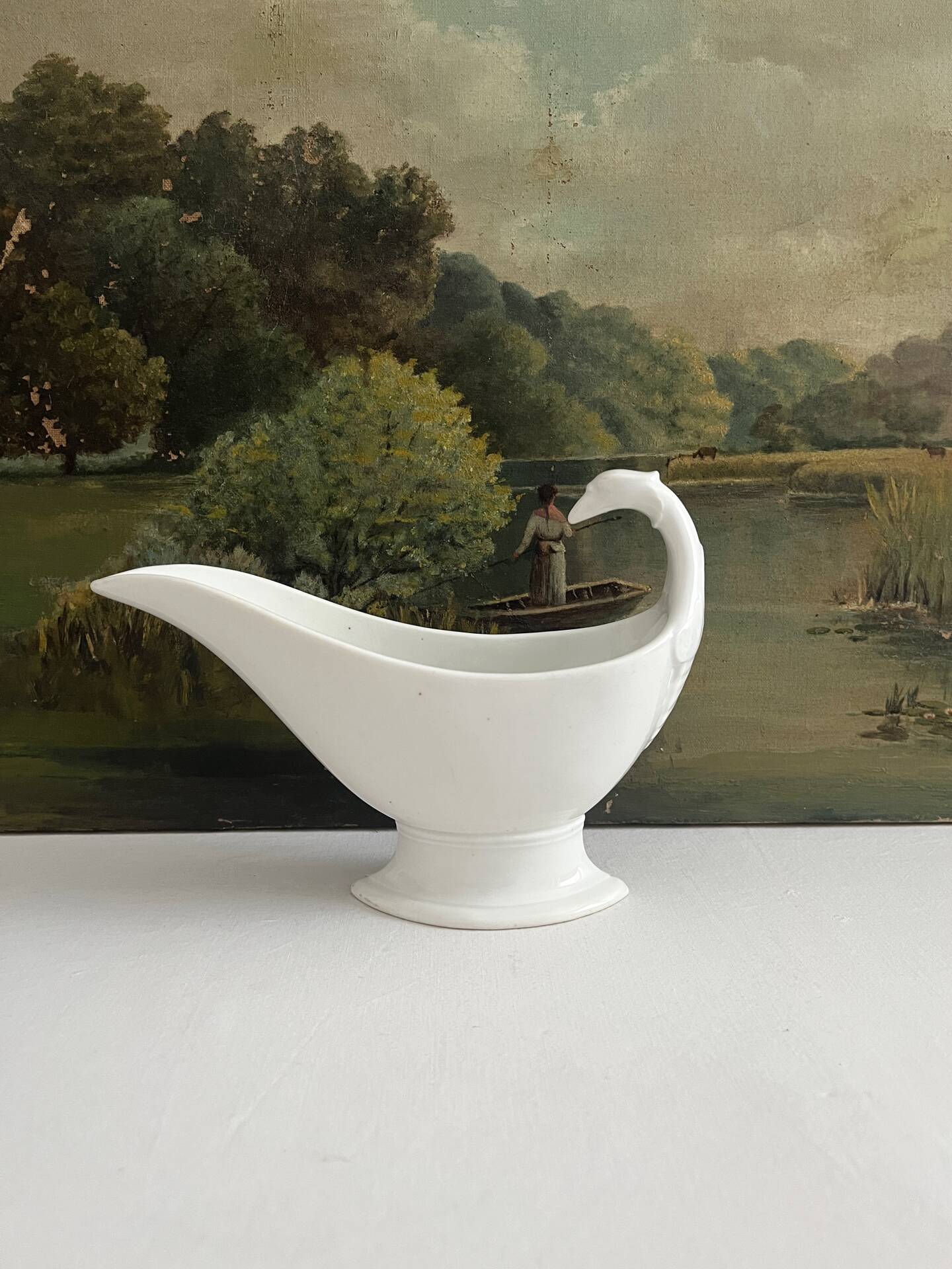 Empire sauce boat with eagle head in antique porcelain