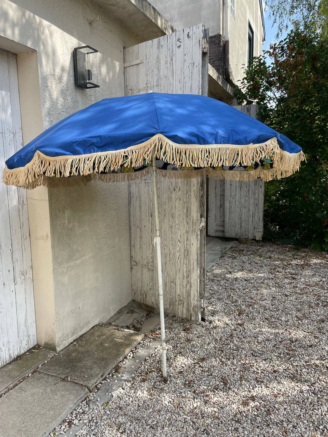 Blue parasol and flowers
