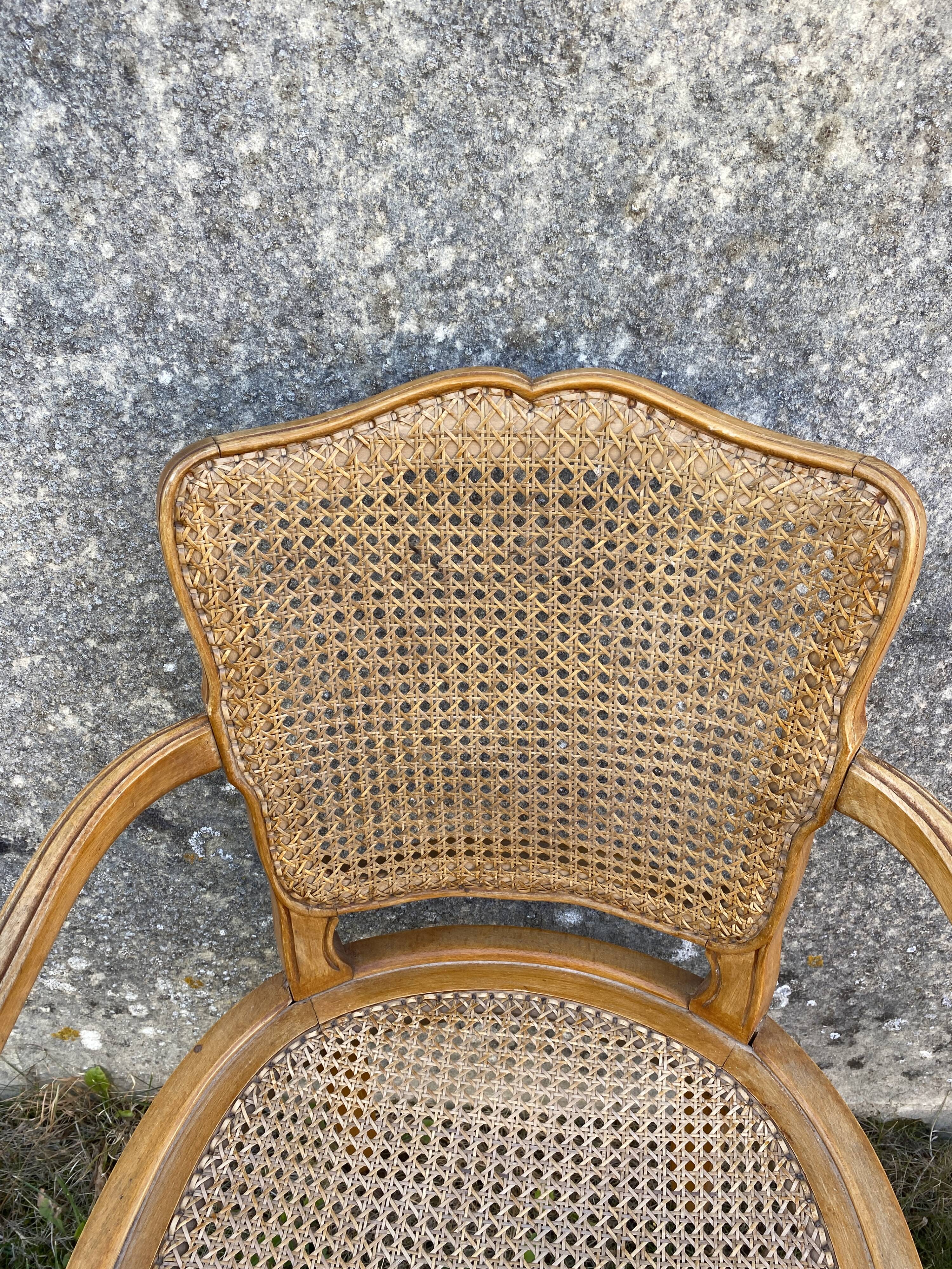 Cane armchair
