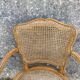 Cane armchair
