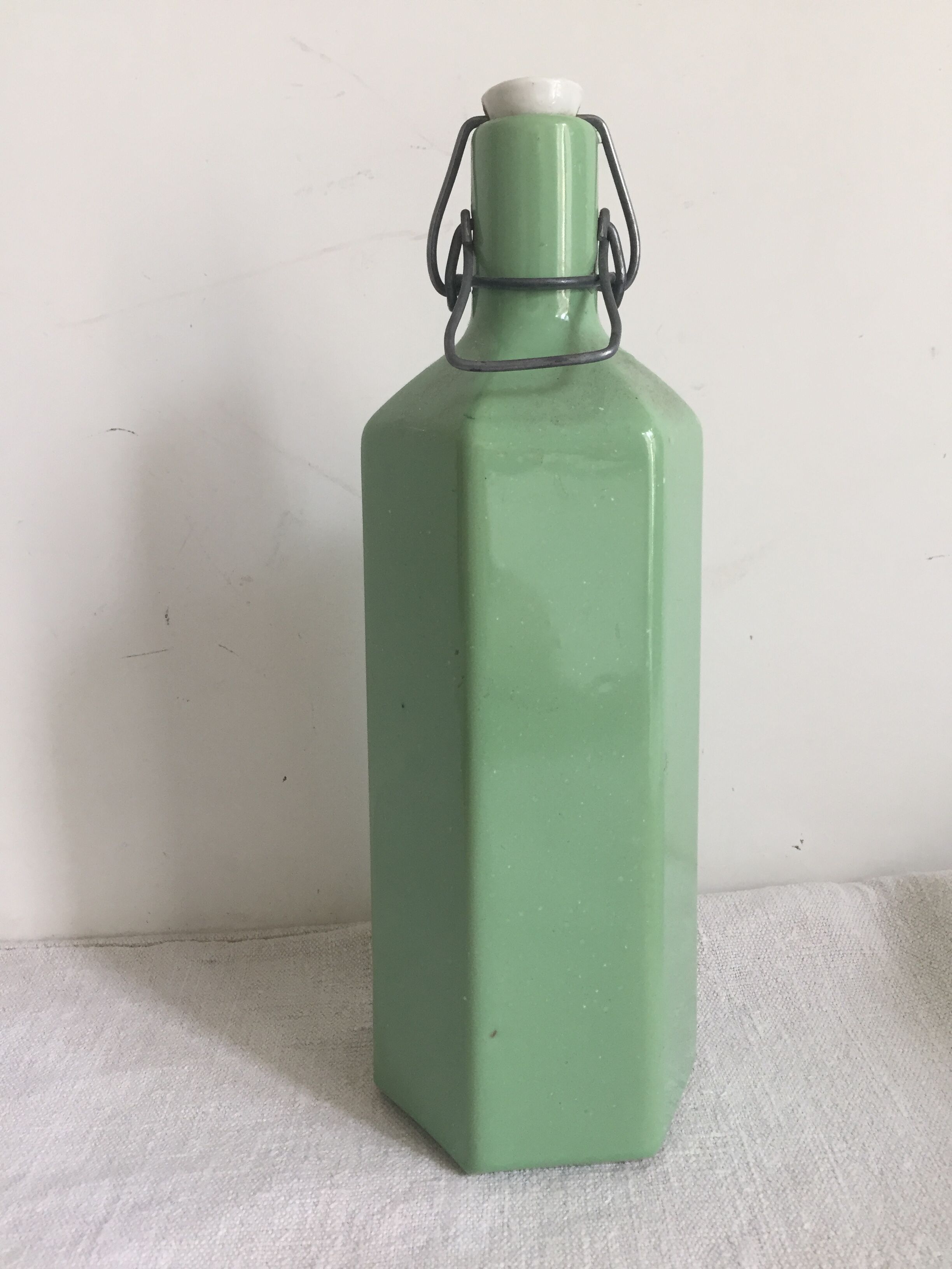 Green hexagonal sandstone bottle
