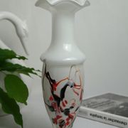 Corolla vase in white opaline with orange-brown patterns.
