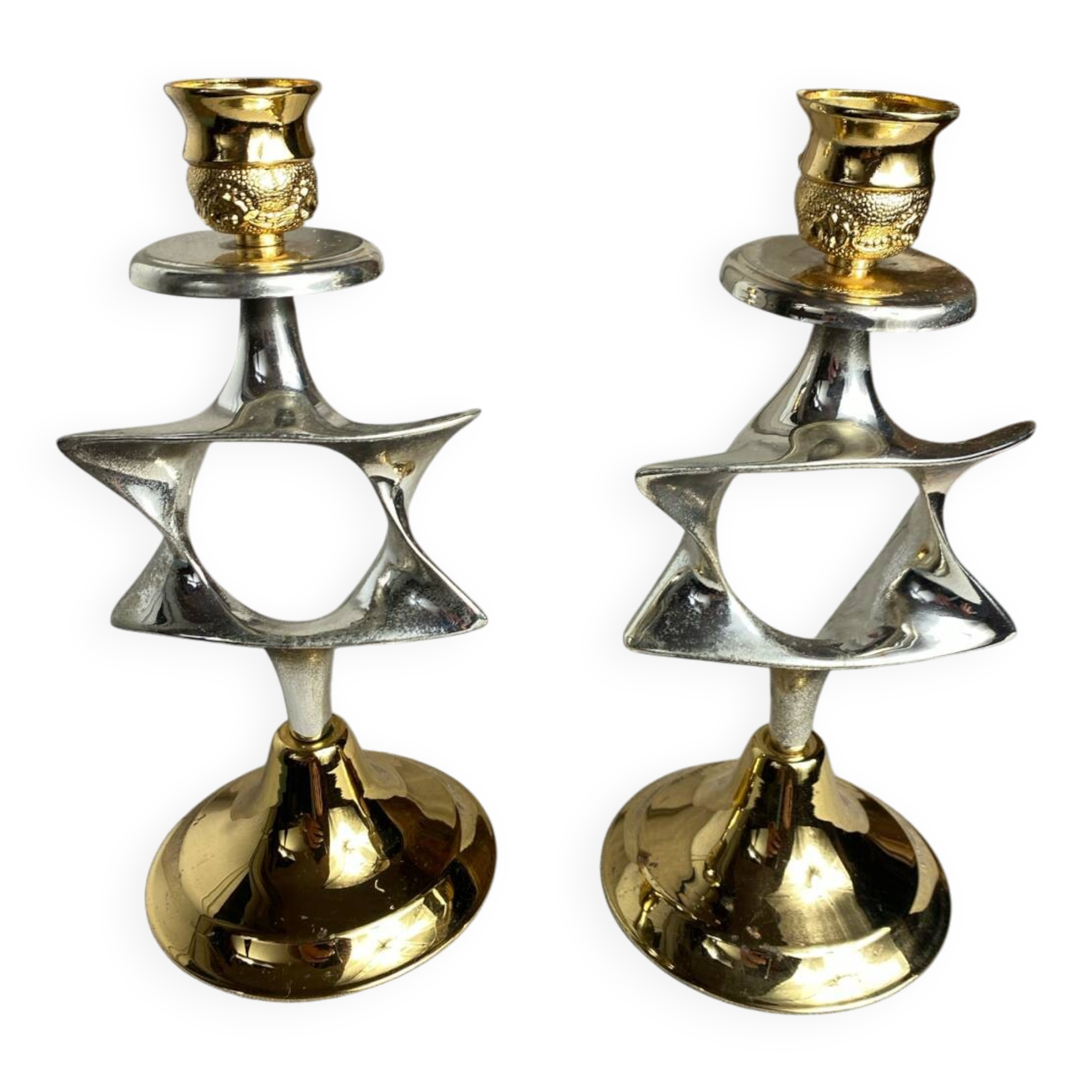 Pair of silver and gold metal candlesticks