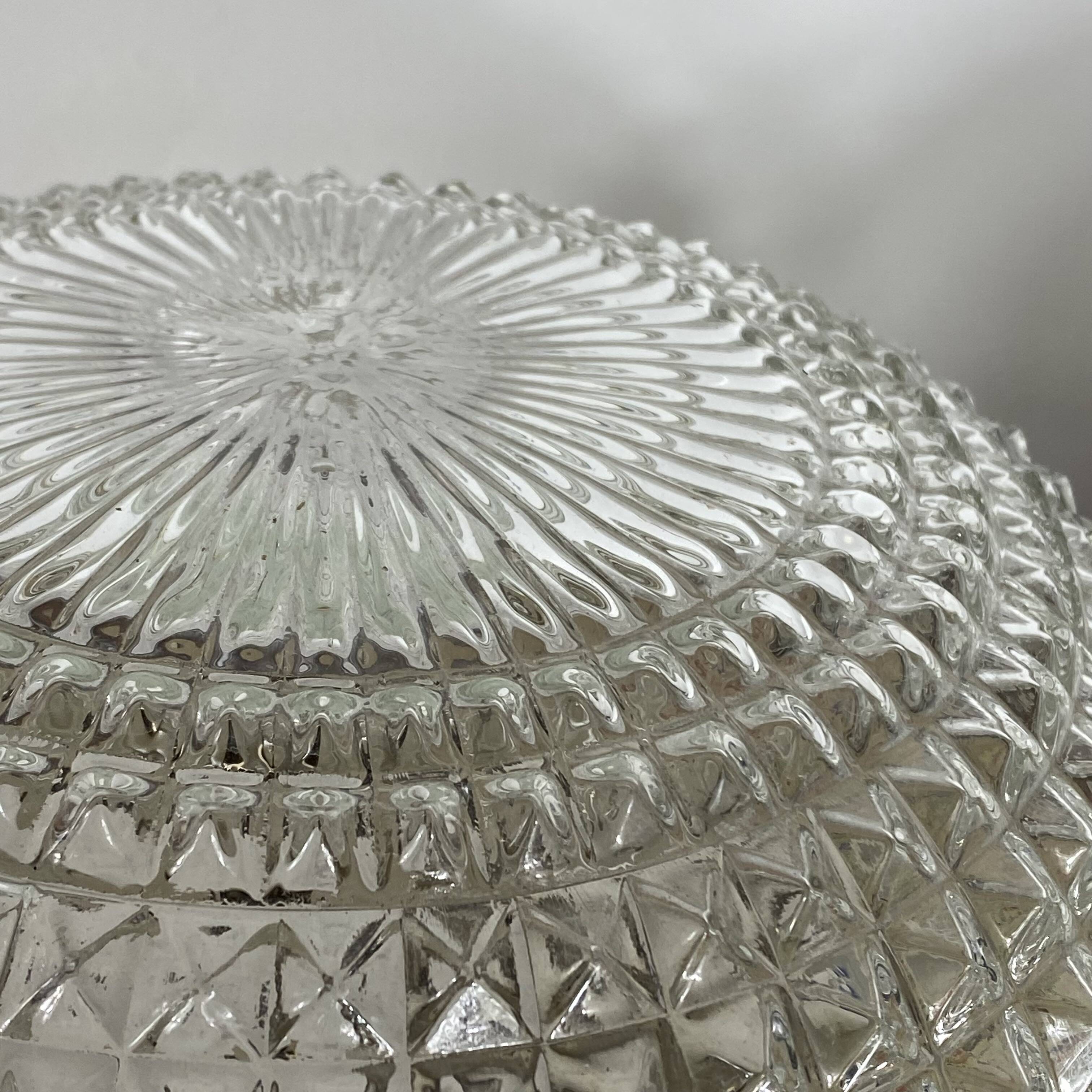 Large pair of round wall sconces ceiling lights in transparent glass.