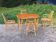 1 table, 1 armchair, 3 bamboo and rattan chairs attributed to Audoux and Minet.