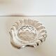Silver scallop shell butter dish.