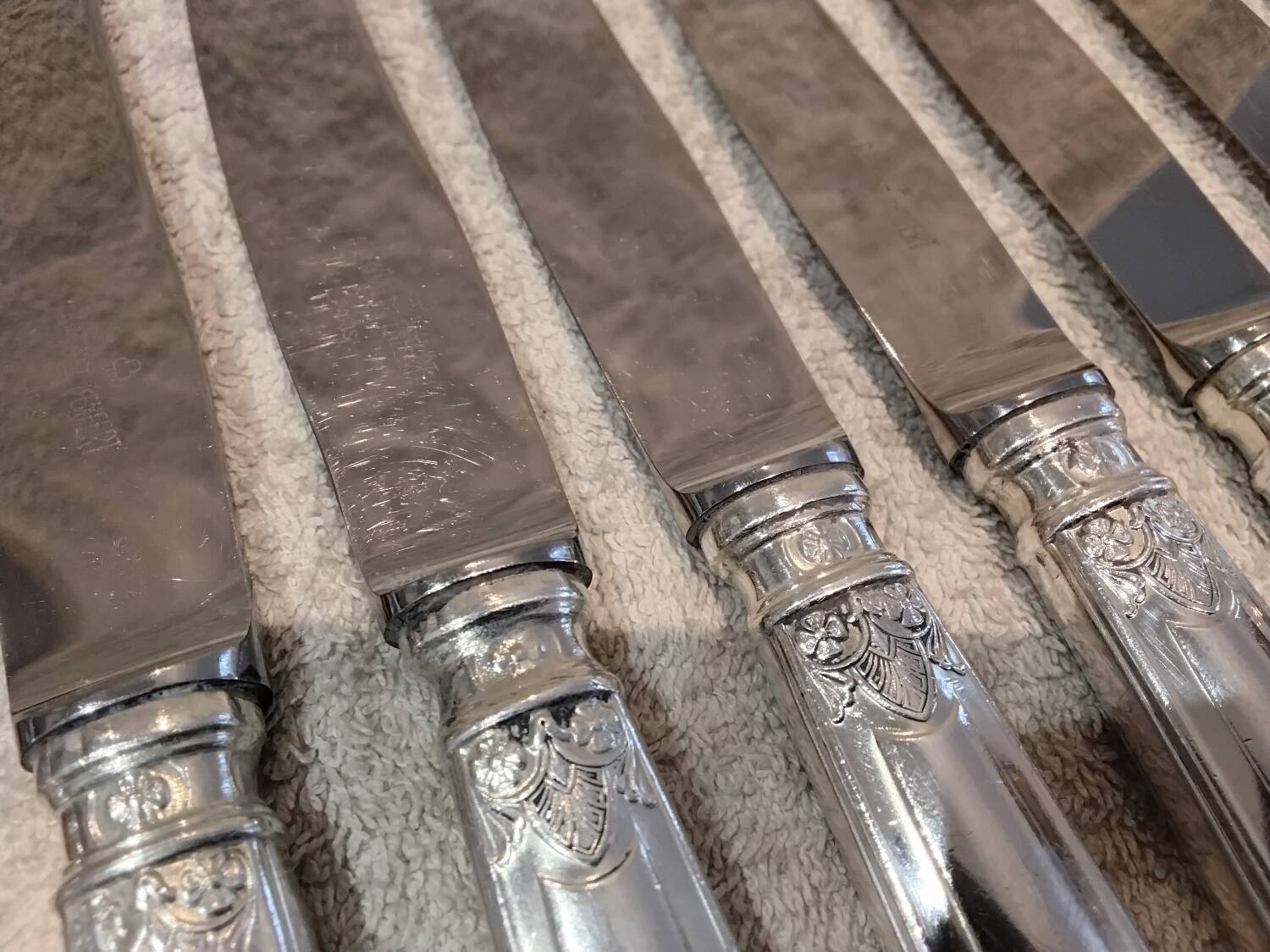 12 silver-plated metal table knives by the silversmith Ravinet Denfert, Empire style, model 81.